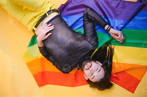 Happy Gay Man Having Fun Holding Rainbow Flag Symbol Of Lgbtq Community