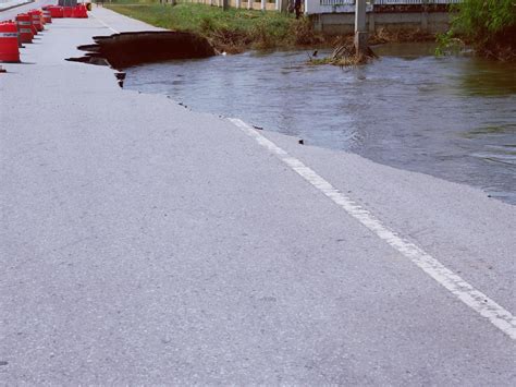 Natural flood disasters have damaged road surfaces and damaged road