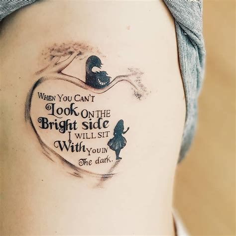 The Perfect Tribute To Alice In Wonderland This Piece Is Both Beautiful And Whimsical Tattoo