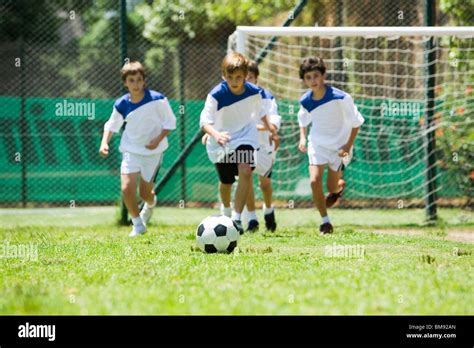 Children playing soccer Stock Photo - Alamy