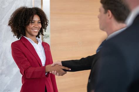 Diverse Business Team Member Shaking Hands At Office Concept Of