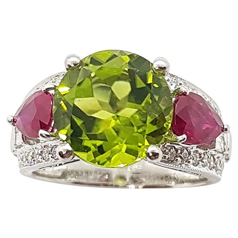 Peridot With Ruby And Diamond Ring Set In Karat Gold Settings At