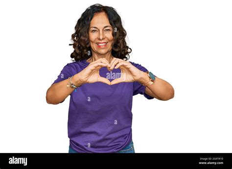 Middle Age Hispanic Woman Wearing Casual Clothes Smiling In Love Doing