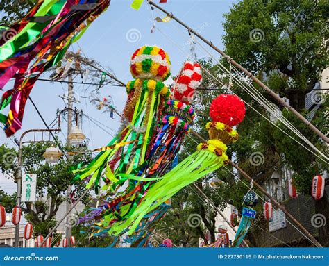 Traditional Japanese Paper Decoration On Bamboo Poles Tanabata