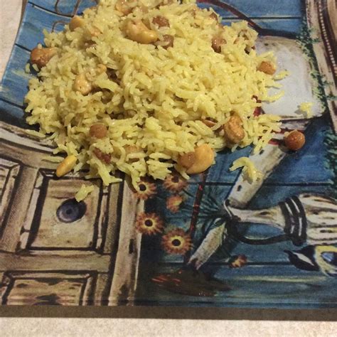 Indian Style Rice With Cashews Raisins And Turmeric Recipe Allrecipes