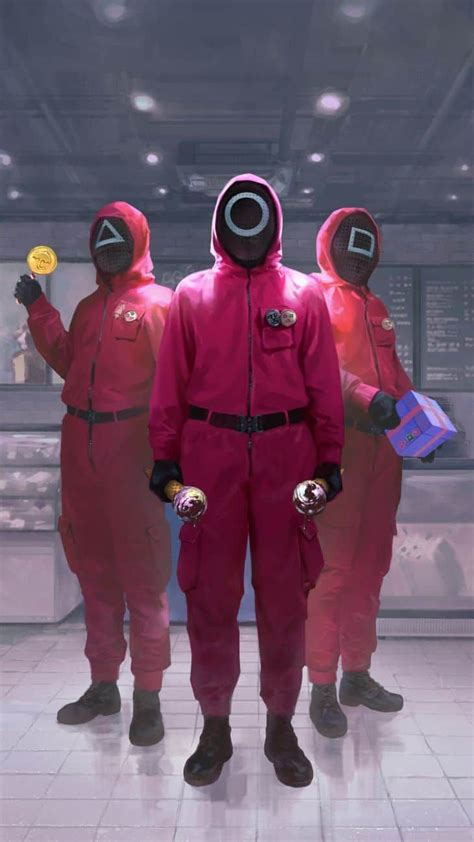 Three People In Pink Spacesuits Standing Next To Each Other