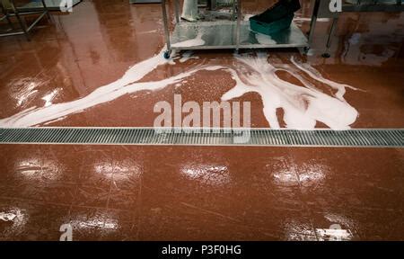 Water Overflowing From Industrial Tank Stock Photo Alamy