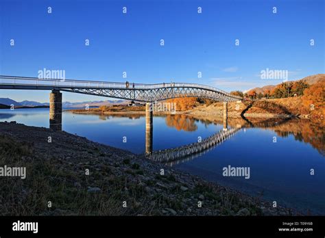 Footbridge At Lake Tekapo Mackenzie Country New Zealand Stock Photo