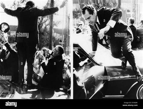 Presidential Candidate Richard Nixon Standing On A Car With Raised His