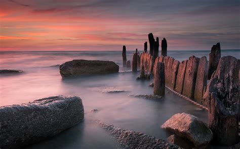 Rock Formation With Body Of Water Landscape Photography HD Wallpaper