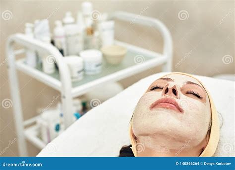 Facial treatment in spa stock photo. Image of client - 140866264