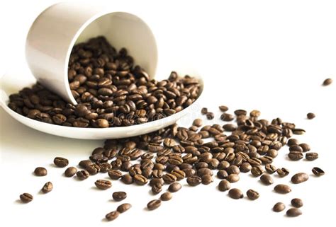 Coffee Beans Spilling Out Of Cup Stock Photo Image Of Coffee