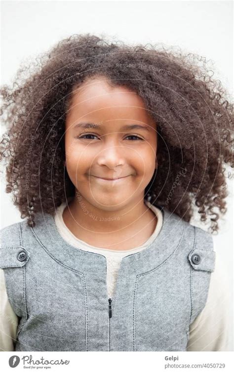 Pretty girl eight years old with beautiful hair - a Royalty Free Stock Photo from Photocase