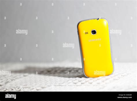 A Yellow Samsung Mobile Phone Stock Photo Alamy