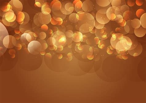 Free Vector Golden Bokeh Lights Background