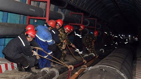 China Mine Rescue Crews Work To Free Trapped Workers In Xinjiang BBC