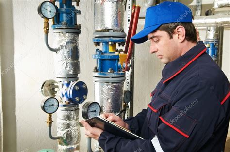 Heating Engineer Repairman In Boiler Room Stock Photo Kalinovsky