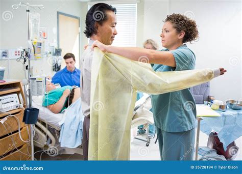 Doctor Preparing To Deliver Baby In Hospital Stock Photo Image Of