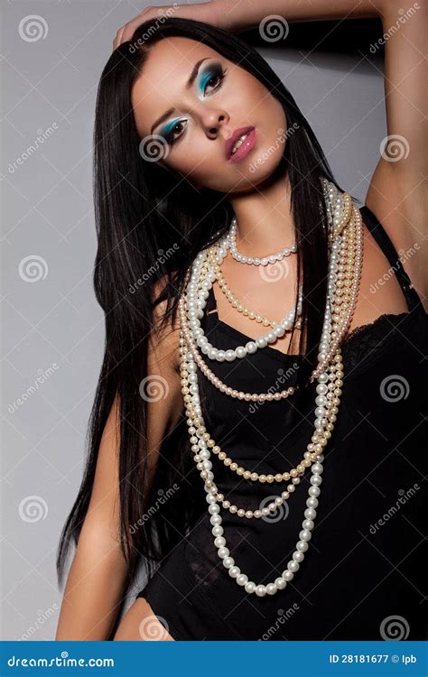 Passionate Young Female Body In Black Lingerie With Beads Stock Image