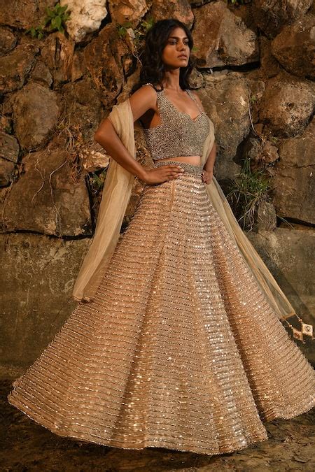 Buy Gold Net Embroidered Crystal Sweetheart Neck Embellished Lehenga