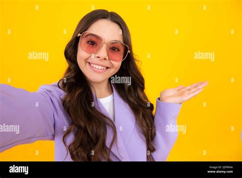 Summer Teen Girl In Sunglasses Making Selfie Posing On Yellow Background Fashion Teenager