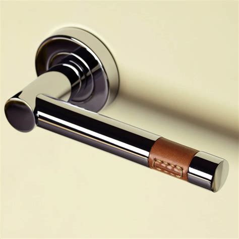 Turnstyle Design Door Handle Tan Leather Polished Brass Model