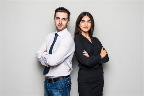 Man And Woman Standing Side By Side