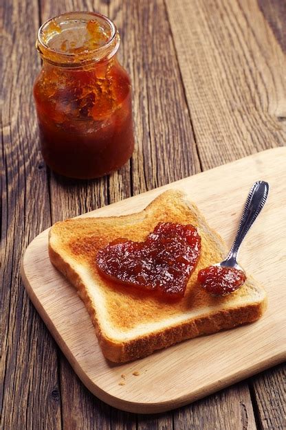 Premium Photo Toast Bread With Jam In Shape Of Hearts