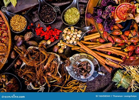 Top View Spices And Herbs Ingredient Decoration On Wood Table For Cook