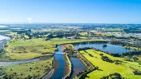 Aerial View On A Beautiful Bridge Across A Small Stream With Mount