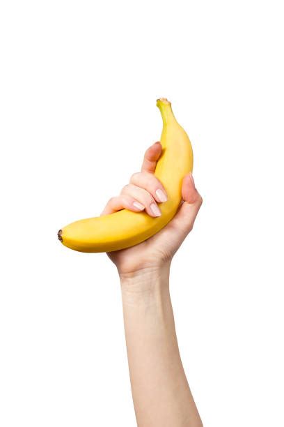 Hand Holding Banana Stock Photos Pictures And Royalty Free Images Istock