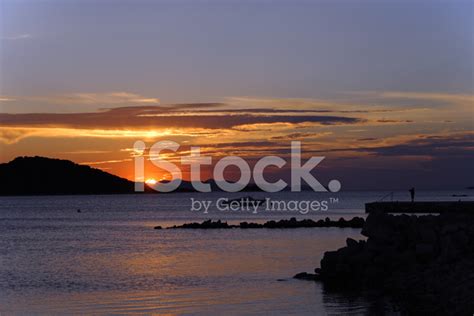 Half Sun Sunset Seascape Stock Photo Royalty Free Freeimages