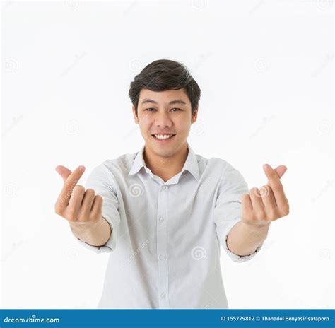 Smiling Asian Man Showing Fingers Heart Symbol And Gesture Stock Photo