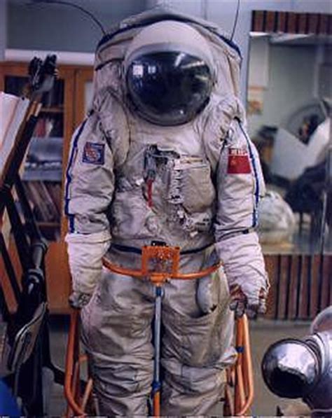 Putting On Orlan Space Suit