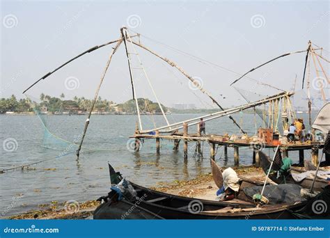 Fishermen Operate A Chinese Fishing Net Stock Photo Image Of