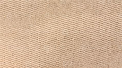 Close Up Texture Of Light Brown Canvas Fabric As Background