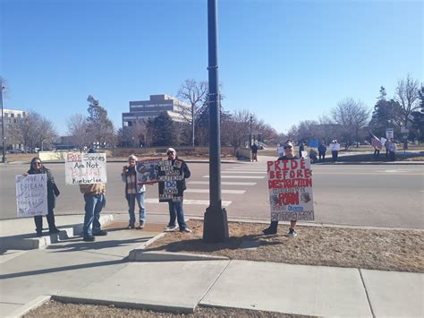 Group protests outside Greeley-Evans School District 6 board members