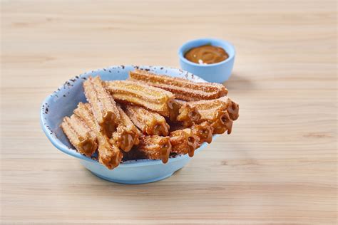 Deliciosos Churros con dulce de leche Recetas Nestlé