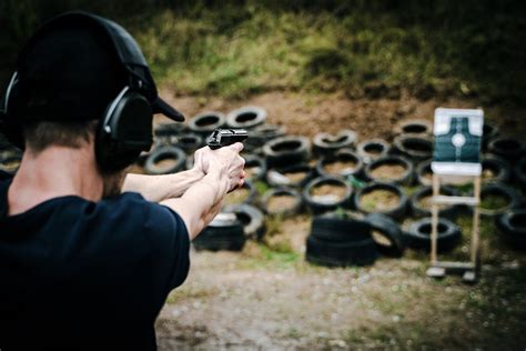 Man Pointing a Gun · Free Stock Photo