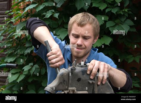 Boy Repairs Motor Scooter Hi Res Stock Photography And Images Alamy