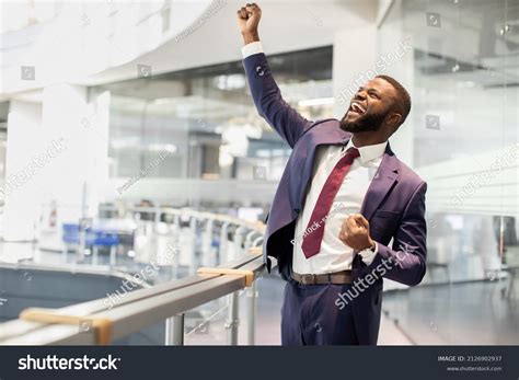 Cheerful African American Young Businessman Celebrating Stock Photo