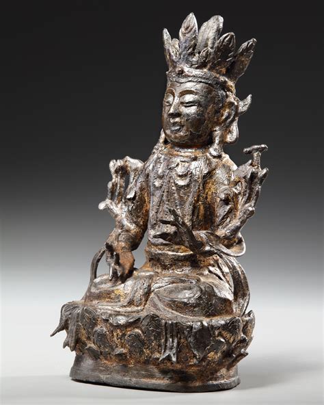 A GILT CHINESE BRONZE FIGURE OF GUANYIN MING DYNASTY 1368 1644