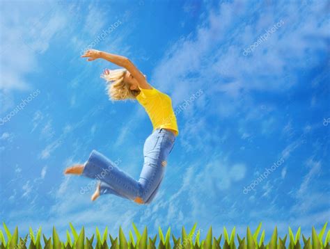 Beautiful Blonde Girl Jumps Over Green Grass — Stock Photo © Nejron