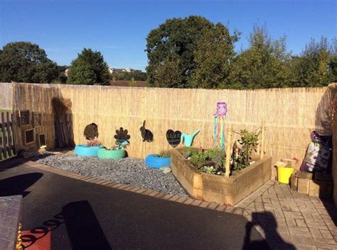 Sensory Garden Herbs And Plants In Flower Bed And Tyres Mirrors Bird