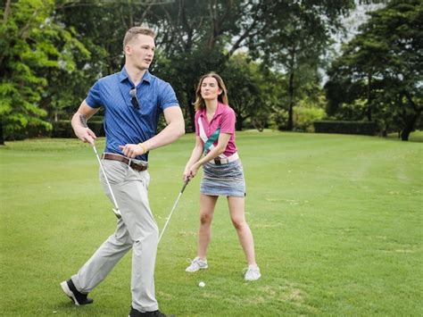 Premium Photo Full Length Of Couple Playing Golf