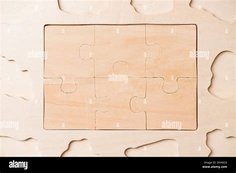 set of wooden puzzles Stock Photo - Alamy