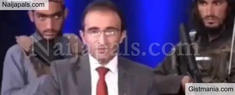 Terrified Afghan Tv Presenter Reads The News Flanked By Gun Toting