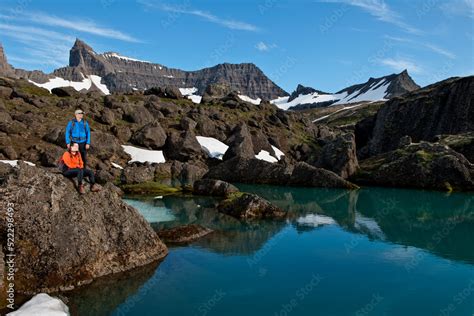 taking a break while hiking in the eastern fjords of Iceland Stock ...