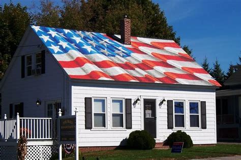 House With An American Flag Painted On The Roof In Lewiston Maine