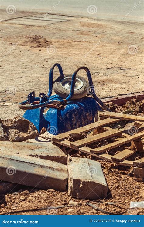 A Broken Metal Wheelbarrow Like Garbage Different Unnecessary Objects